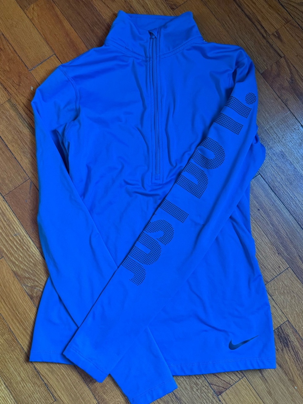 Nike Bright Blue Long Sleeve Athletic Top with Black Strap Detail